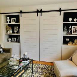 White painted barn door living room